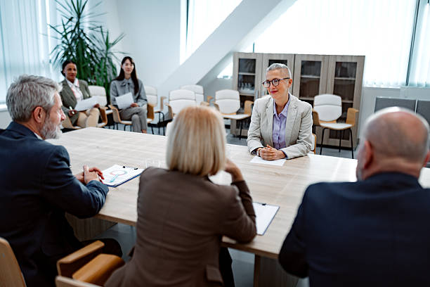 istock Female Professional Conducting Boardroom Meeting 2253527866