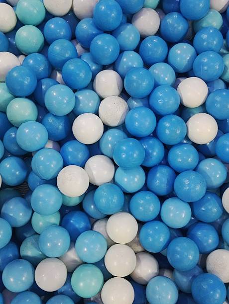 istock Playful Texture of Blue and White Plastic Ball Pit Spheres 2253532633