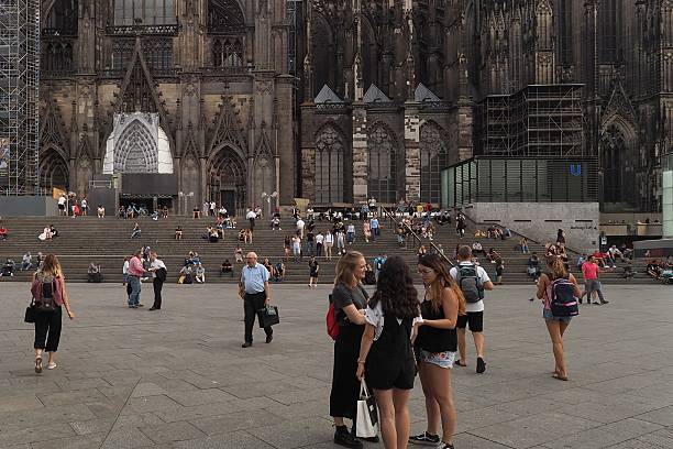 Koeln, Germany - August 28, 2019: People in front of Cologne cathedral