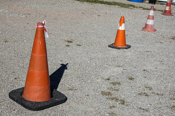 istock Traffic cones are on gravel in a work zone 2253533205