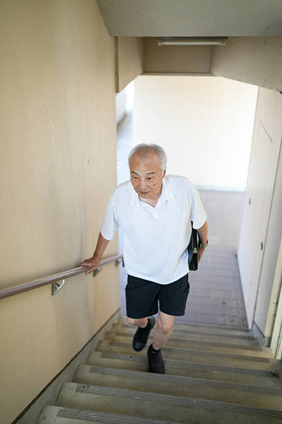 istock An elderly man wearing a white shirt 2253534220