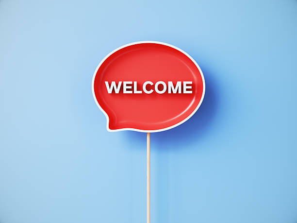 istock Welcome Written on Red Speech Bubble Over Blue Background 2253534430