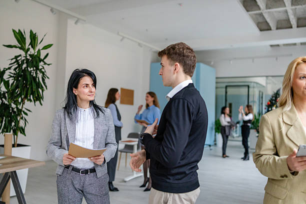 istock People working together in a modern office space during the day 2253544979