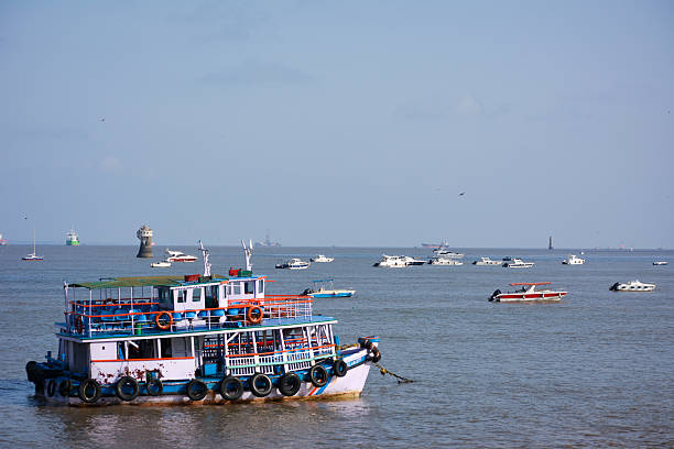 Mumbai, India - May 25, 2017: Passenger ferries moored in the Arabian Sea.