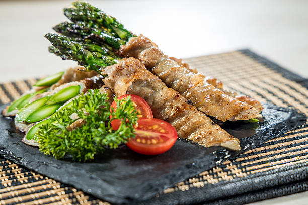 istock grilled bacon wrapped asparagus skewers 2253555344