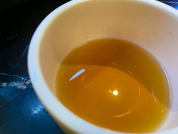 istock Green tea on a white cup close up shot 2253558918