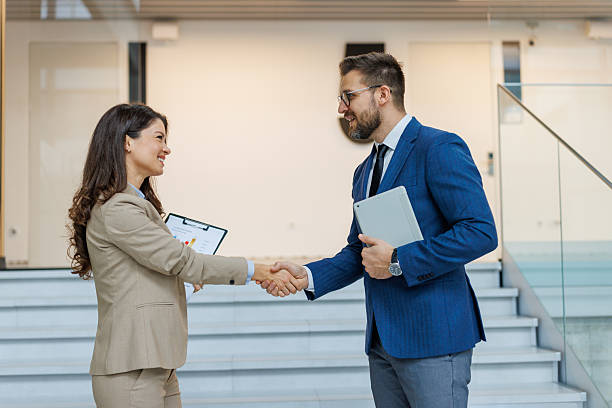 istock Business partners shaking hands closing successful deal 2253559428