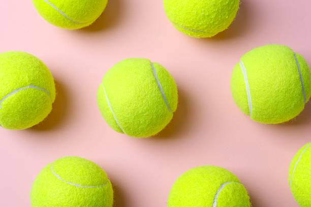 istock Tennis balls on a color background 2253562793