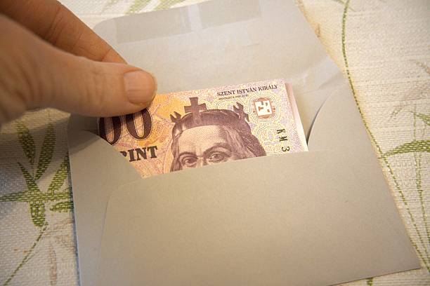 istock Hungarian number 10000 Forint Banknote Inside Envelope Close-Up 2253564403