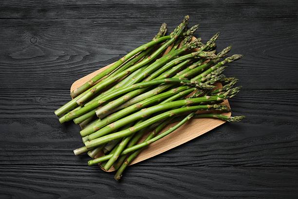 istock Fresh green asparagus on the table 2253565588