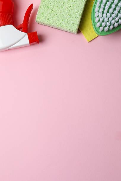 istock Many different house cleaning products on color background, top view 2253565698