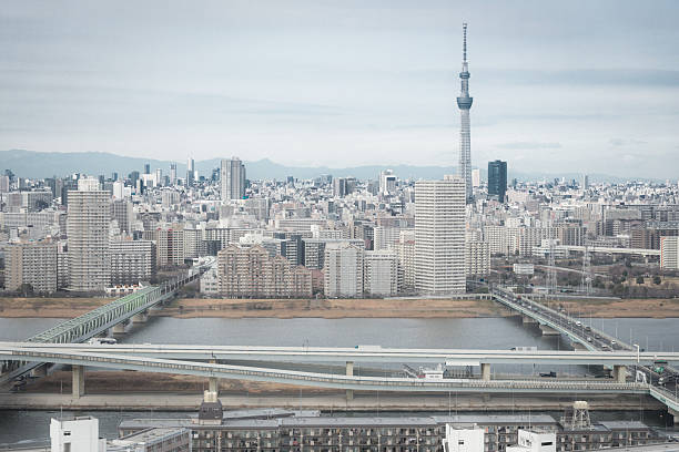 The iconic spire of the Tokyo Skytree overlooking the highrise cityscape of central Tokyo, Japan’s vibrant capital city.