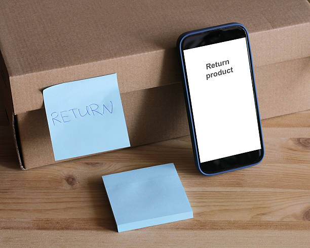 istock Online product return process with smartphone and cardboard box 2253566454