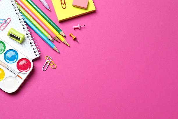 istock School supplies creatively arranged on a color surface, including pencils, scissors and stationery. Top view 2253566853