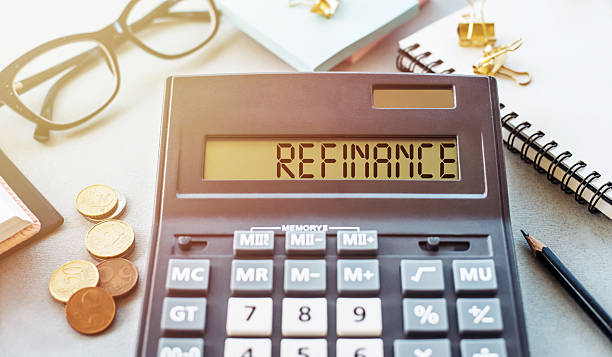 istock A calculator displaying the word refinance on its screen. 2253568641