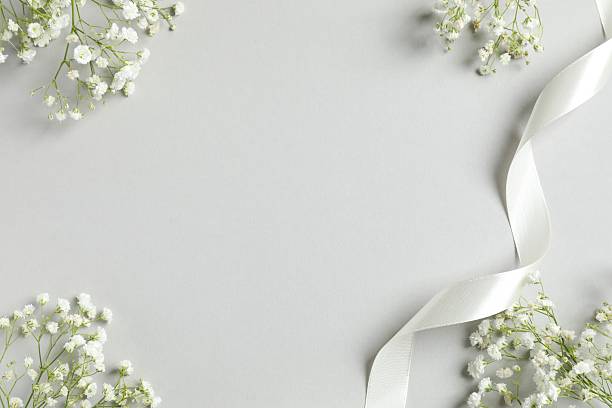 istock Top view photo with gypsophila flowers on grey background with empty space 2253570365
