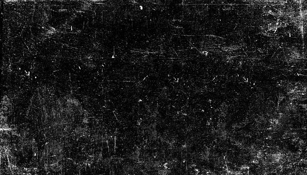 istock Aged black grunge texture with scratches and distressed marks, perfect for backgrounds or overlays 2253571066