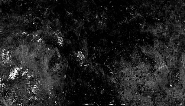 istock Aged black and white grunge texture with scratches and stains, creating distressed and vintage appearance 2253571211