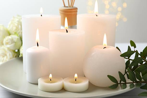 istock Beautiful composition with candles on the table 2253571235