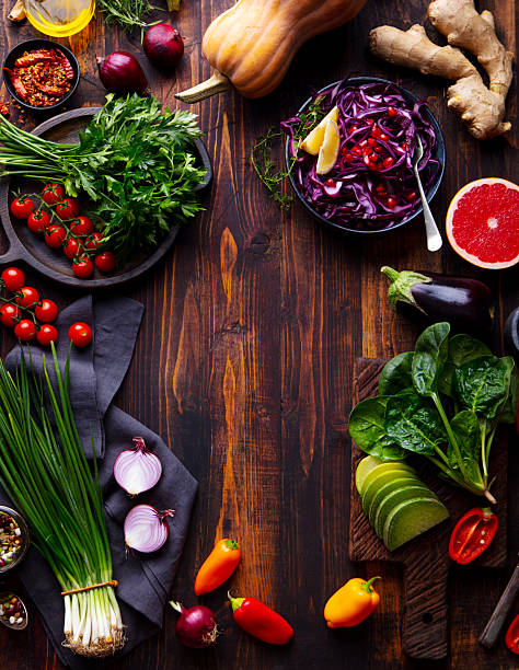 istock Assortment of fresh vegetables on a wooden background. Copy space. Top view. 2253571849