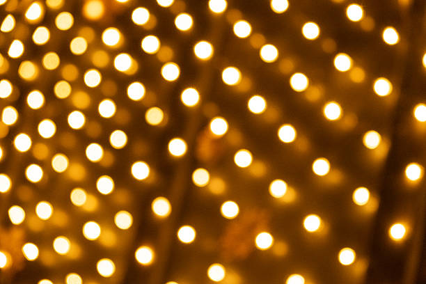 istock Festive Golden Light Dots Pattern for Holiday Design. 2253580325