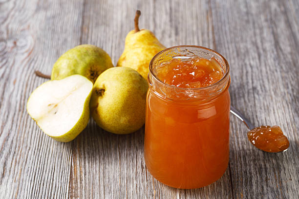 istock Homemade pear jam in glass jar with fresh fruit 2253590824
