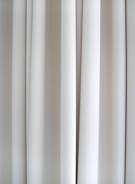 istock White Curtain Fabric Texture With Soft Vertical Folds 2253591766