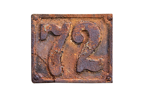 istock Rusty House Number 72 Isolated 2253595847