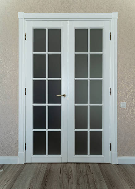 istock Elegant White Double Interior Doors with Frosted Glass Panels in Modern Classic Home Interior 2253598472