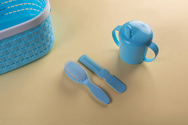 istock Blue plastic baby boy essentials collection 2253599116
