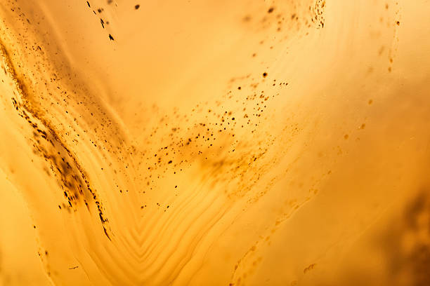 Agate macro detail. close-up of a textured semi-precious gemstone background. backlight transparency