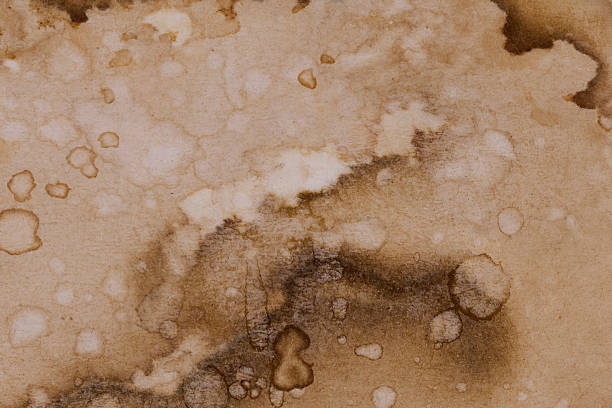 istock Brown Coffee Rings and Splashes on Paper 2253601516
