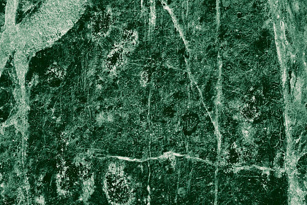Rendered under soft light, this mossgreen coloration marble surface highlighting organic swirl patterns, ideal for architectural render surfaces.