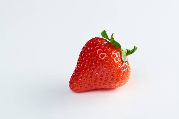Strawberries with strawberry leaf on a White background.
