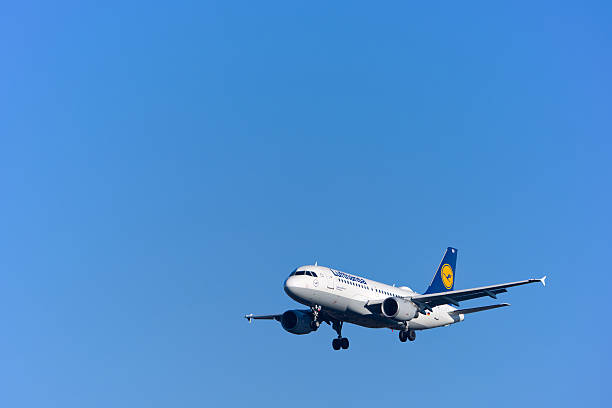 Lufthansa passenger airplane type Airbus A319-100 registration D-AIBD landing at German Frankfurt Airport on a sunny autumn day. Photo taken November 22nd, 2025, Frankfurt am Main, Germany.