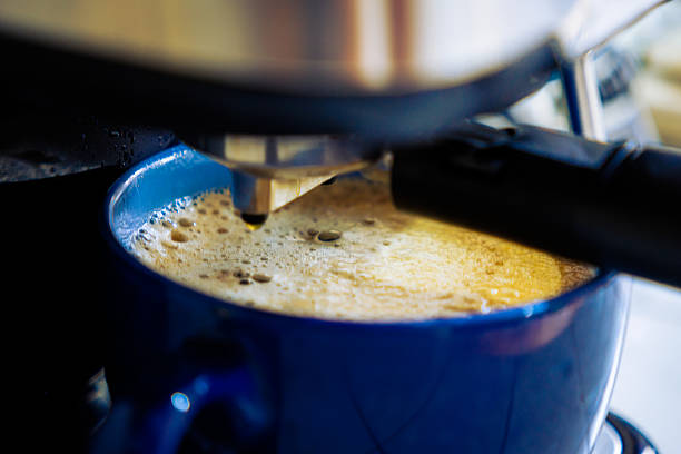 Coffee Machine brewing an espresso in a cup