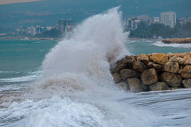 waves crashing on rocks nearthe sea