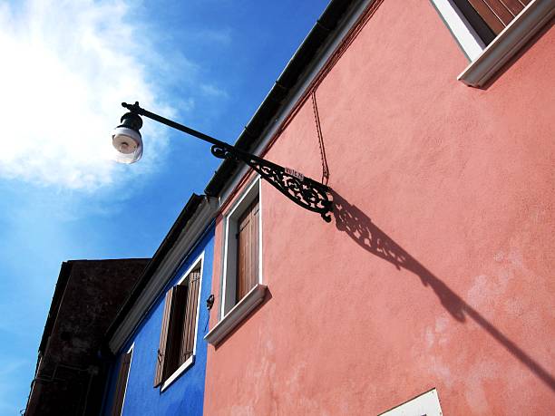 Burano island street, colorful houses in the Venice lagoon. Italy, Europe.