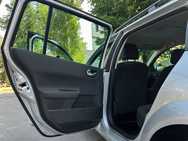 istock An interior view of a contemporary car reveals an elegantly designed space, featuring an inviting open door and thoughtfully arranged comfortable seating for passenger convenience and enjoyment 2253615480