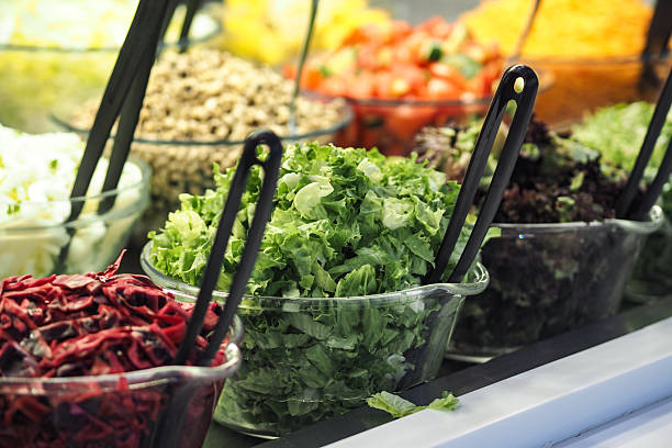 istock Fresh salad ingredients arranged in a colorful display 2253615496