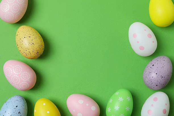 istock Happy Easter. Colorful eggs on color background, space for text or advertising 2253615517