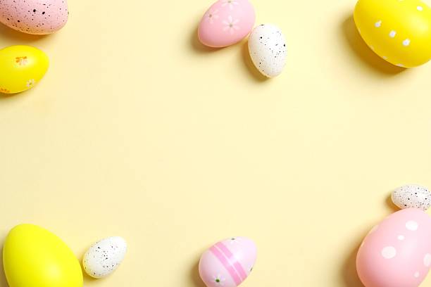 istock Happy Easter. Colorful eggs on color background, space for text or advertising 2253616265