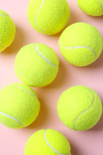 istock Tennis balls on a color background 2253616771