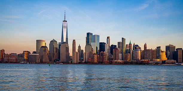 istock Lower Manhattan from New Jersey just before sunset in late December 2253617086