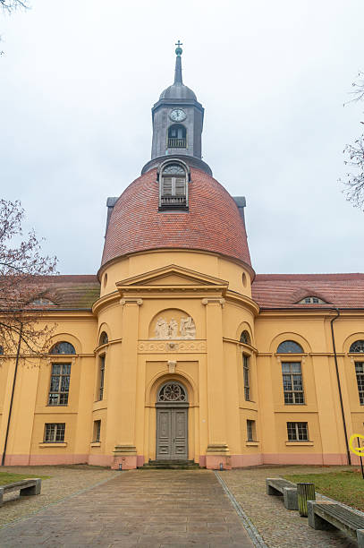 Liebfrauenkirche  is a Catholic church in Zurich, Switzerland. Due to the influx of Catholic immigration in Zurich in the 19th century, it was built from 1893 to 1894 under the Romanesque Revival architecture designs of the architect August Hardegger. The image shows the main nave an benches.