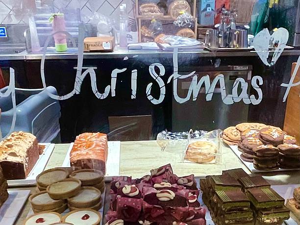 istock Christmas Bakery Window Display with Festive Cakes and Desserts 2253629758