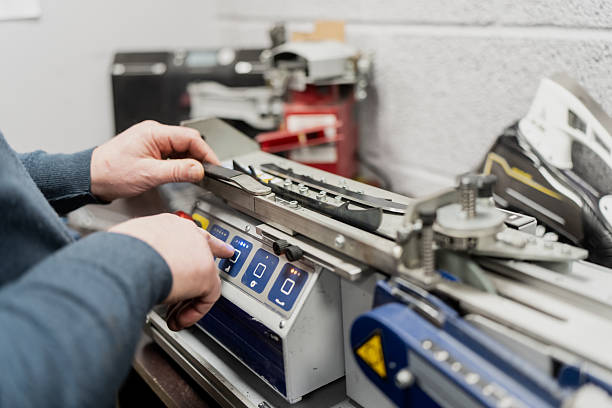 istock Professional hockey skate sharpening machine used by elite teams for precise blade maintenance, highlighting automated sports equipment servicing and ice hockey support industry 2253630719