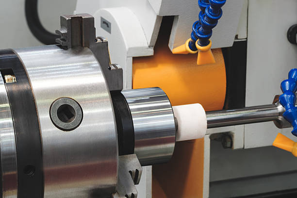 istock Industrial sharpening machine with large abrasive white disc sharpening round metal part, industrial concept background 2253630989