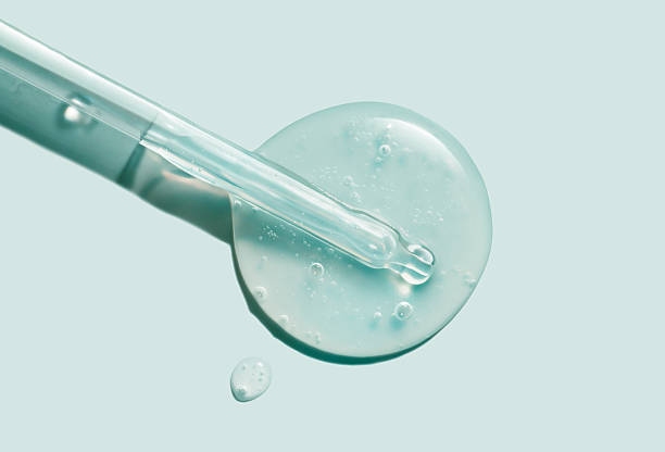 istock Pipette dropper with serum drops 2253631242