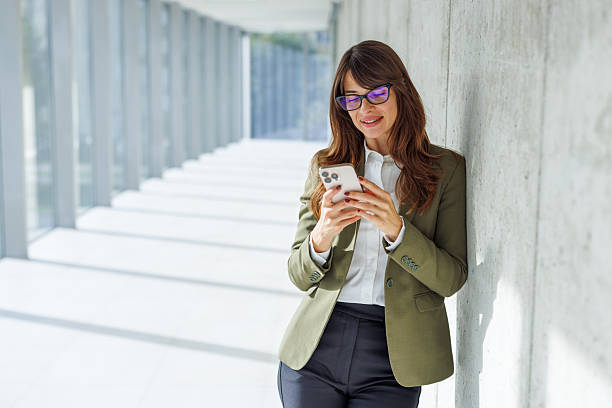 istock Businesswoman using smartphone 2253631538